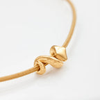 Ole Lynggaard Copenhagen Snakes armbånd mini charm beige, gull